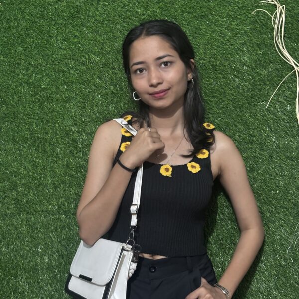 Black tank top with sunflower strap details, perfect for casual summer wear.
