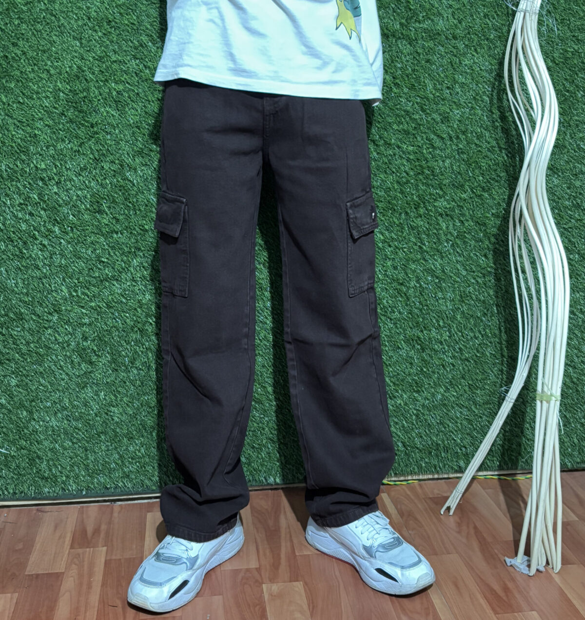 Men’s brown cargo pants with a relaxed fit, made from a durable cotton blend fabric, featuring 6 utility pockets and an adjustable waistband for a perfect fit.